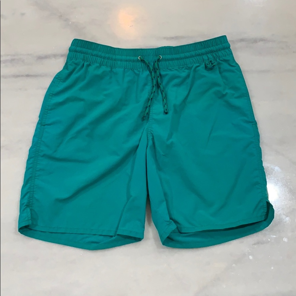 Men’s green bathing suit.